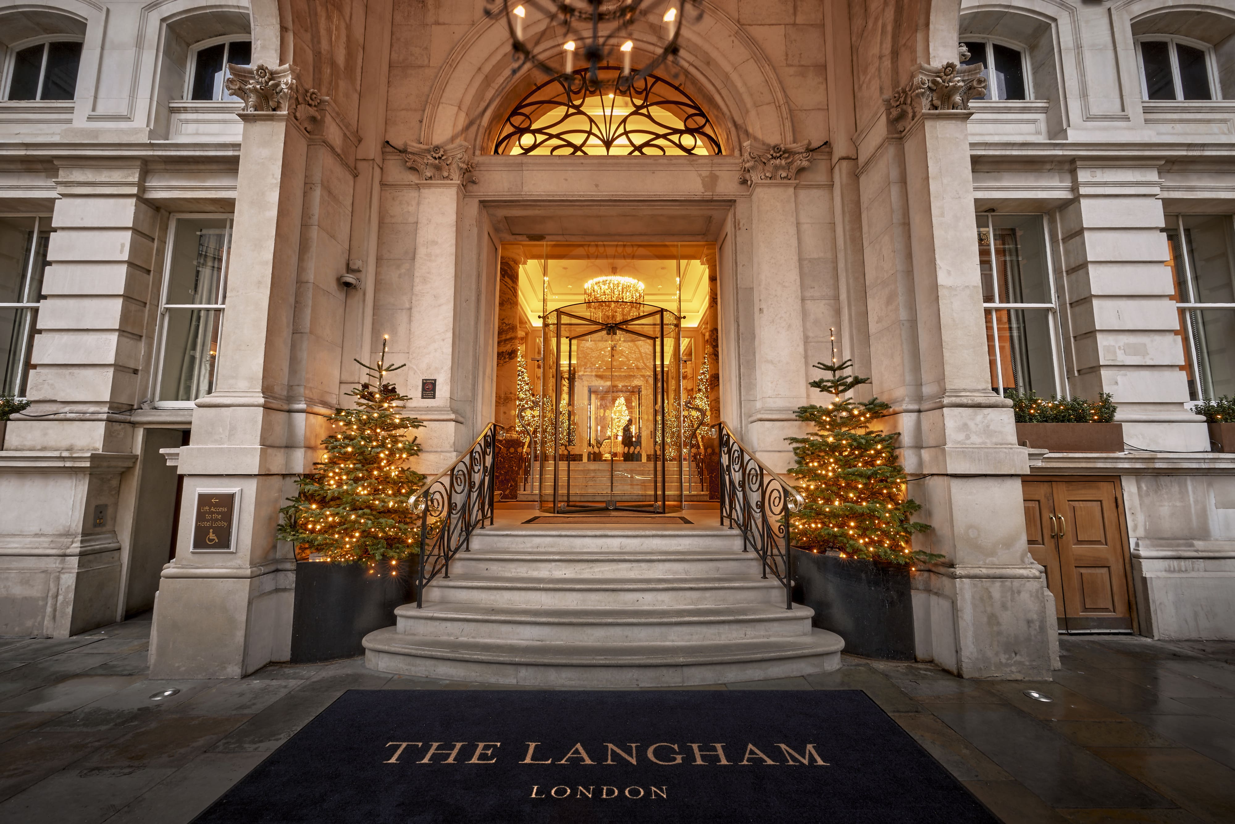 Steps leading up to the doorway of The Langham Hotel in London