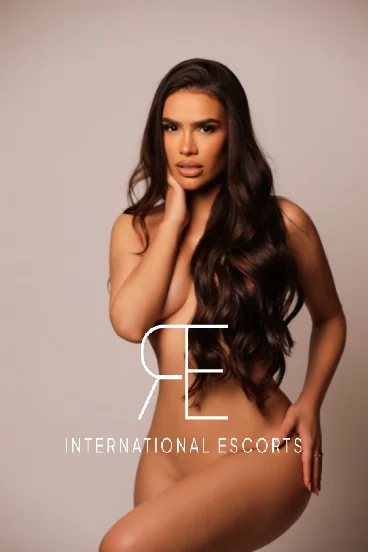 A profile picture of a brunette escort named Addie at this agency 