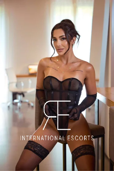 High class Brazilian escort Arissa is wearing black lingerie 