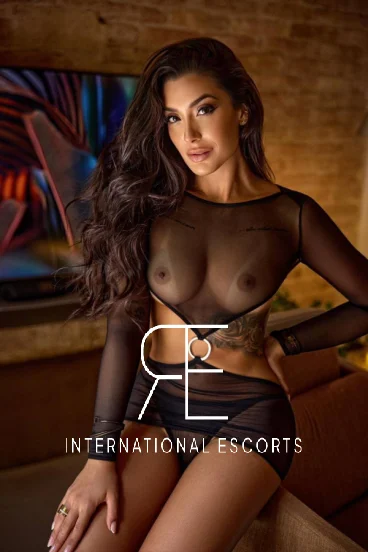 Elite London escort Arissa pictured in see through black lingerie 
