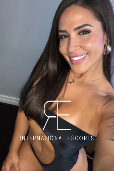 Selfie of a smiling Brazilian escort 