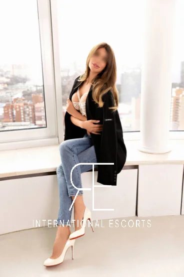 London escort Nelly dressed smart casual 