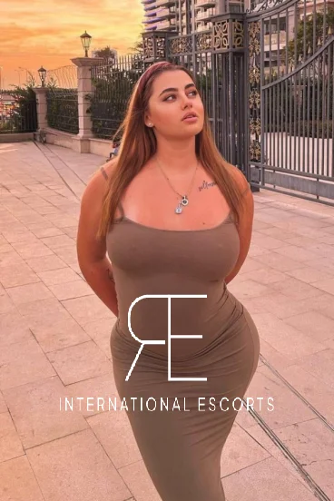 Rayana looks very sexy pictured wearing a beige dress 