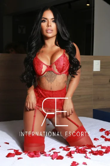 Sexy curvy £300 an hour Brazilian escort on her knees 