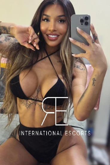 Beautiful Brazilian escort taking a selfie 