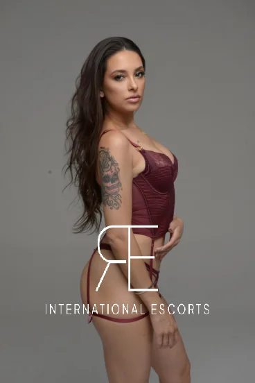 Beautiful Brazilian escort with a arm tattoo 