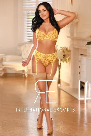 London escort Sugar wearing sexy lingerie and heels 