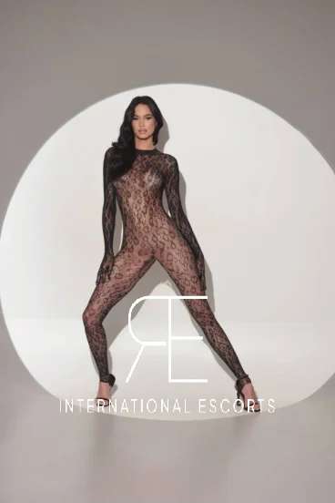 Bernadette looks very elegant and sexy wearing a body stocking 