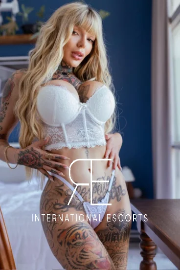 Slim busty blonde London escort Lara Seven