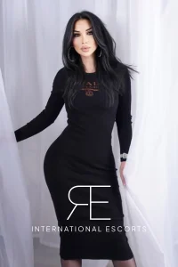 Cosmopolitan Rosaline in elegant black dress, Russian beauty with style